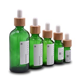 green essential oil bottle