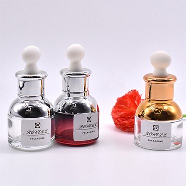 gradient red shoulder serum bottle