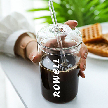 Coffee cup with glass straw